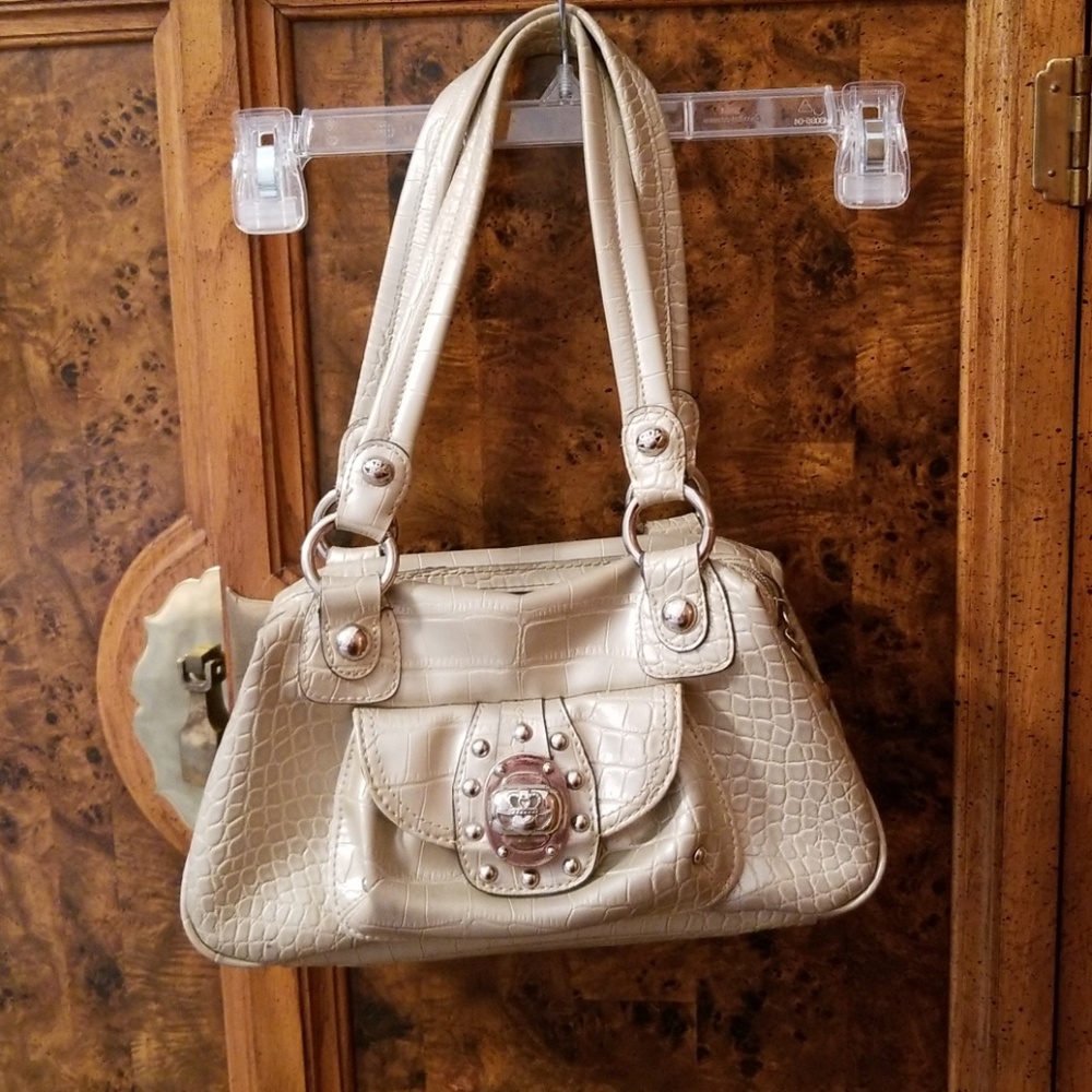 Kathy Van Zeland ivory purse